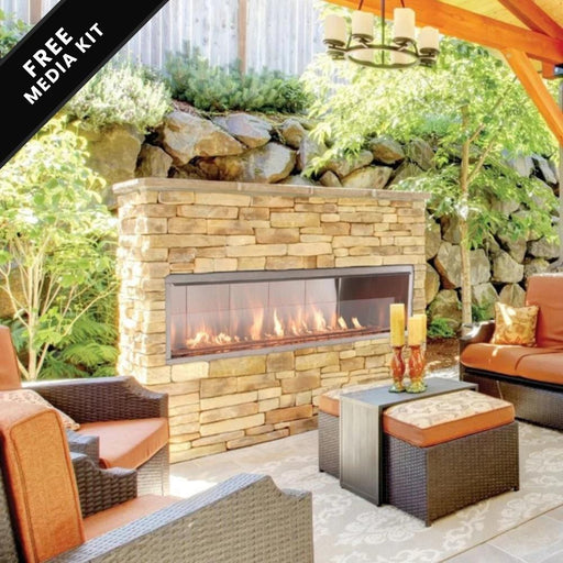 Outdoor stone fireplace with realistic flames, surrounded by cozy patio seating and lush greenery under a pergola.