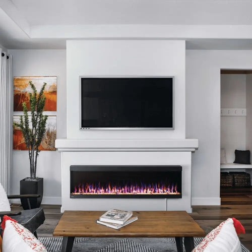 Modern living room with a wall-mounted electric fireplace below a large TV, featuring colorful flames and minimalist decor.